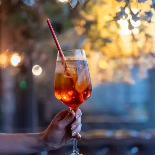 Aperol spritz on the terrace at dusk at Bella Vista, Bristol