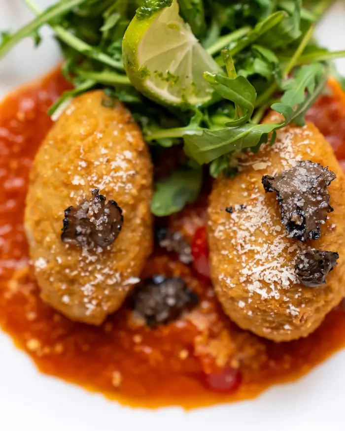 Crispy arancini on tomato sauce with rocket from the Bella Vista menu, Bristol