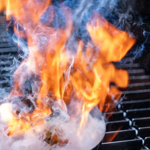 Flames leaping from a pan in Bella Vista's kitchen, Bristol